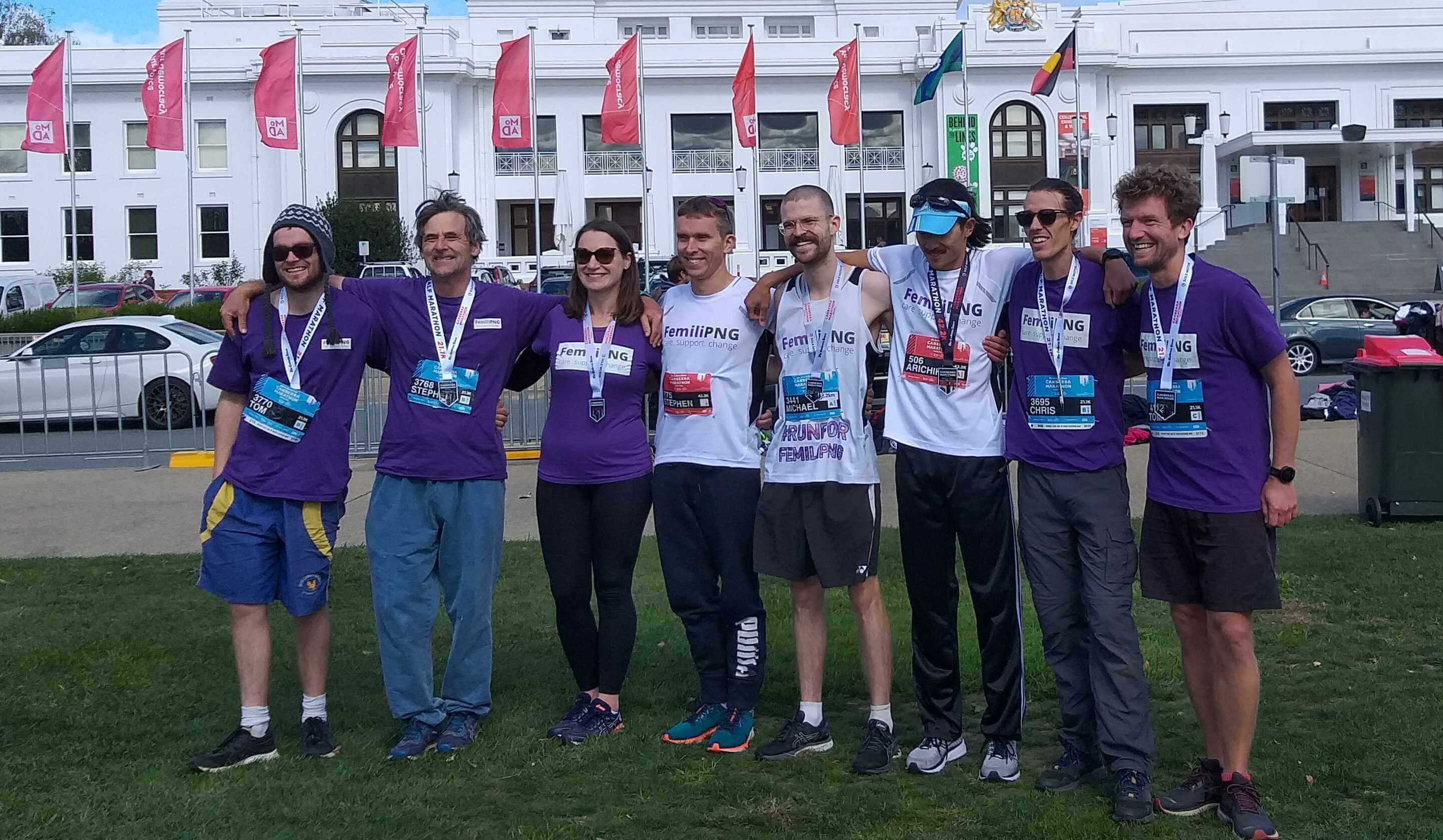 Tom with the FemiliPNG team in front of Old Parliament House, Canberra after completing his half marathon at The Canberra Times Marathon Festival