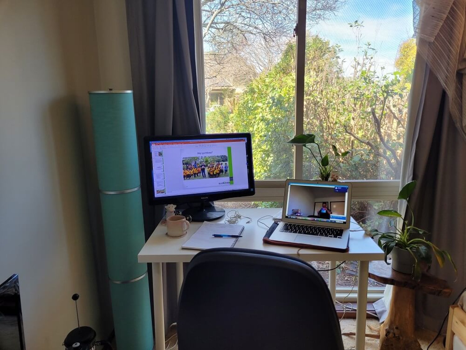 Photo of Tom's remote lecture setup, in his home office in front of a window