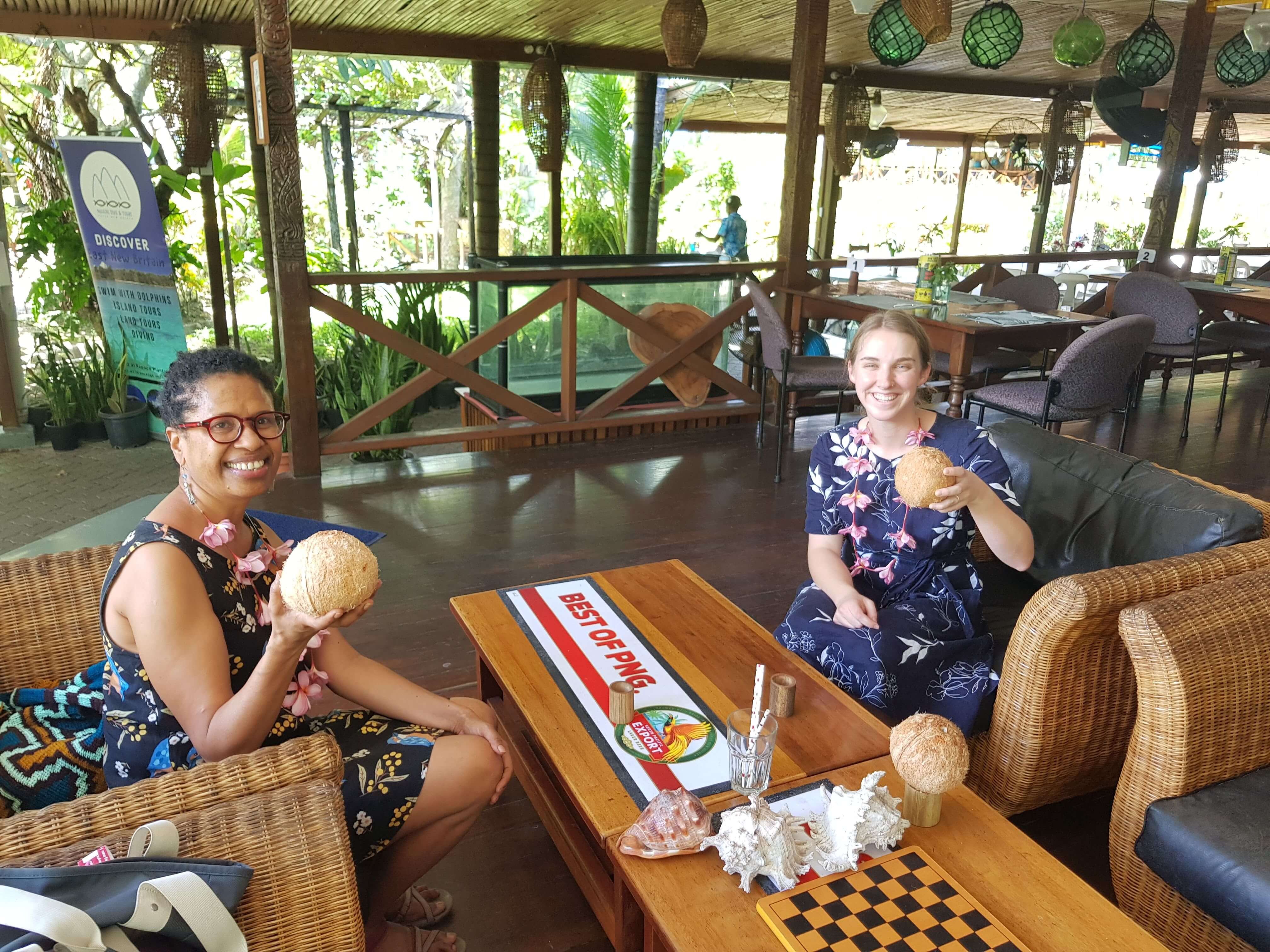 Sustineo staff drinking coconut cocktails