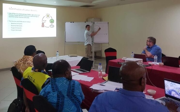 Workshop participants listening to a presentation