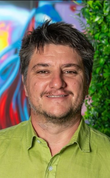 Headshot photo of Ben