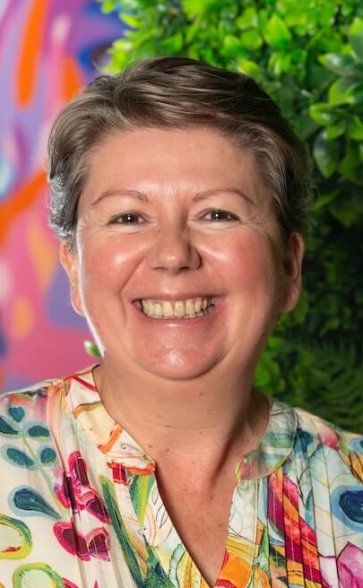 Headshot photo of Nicky