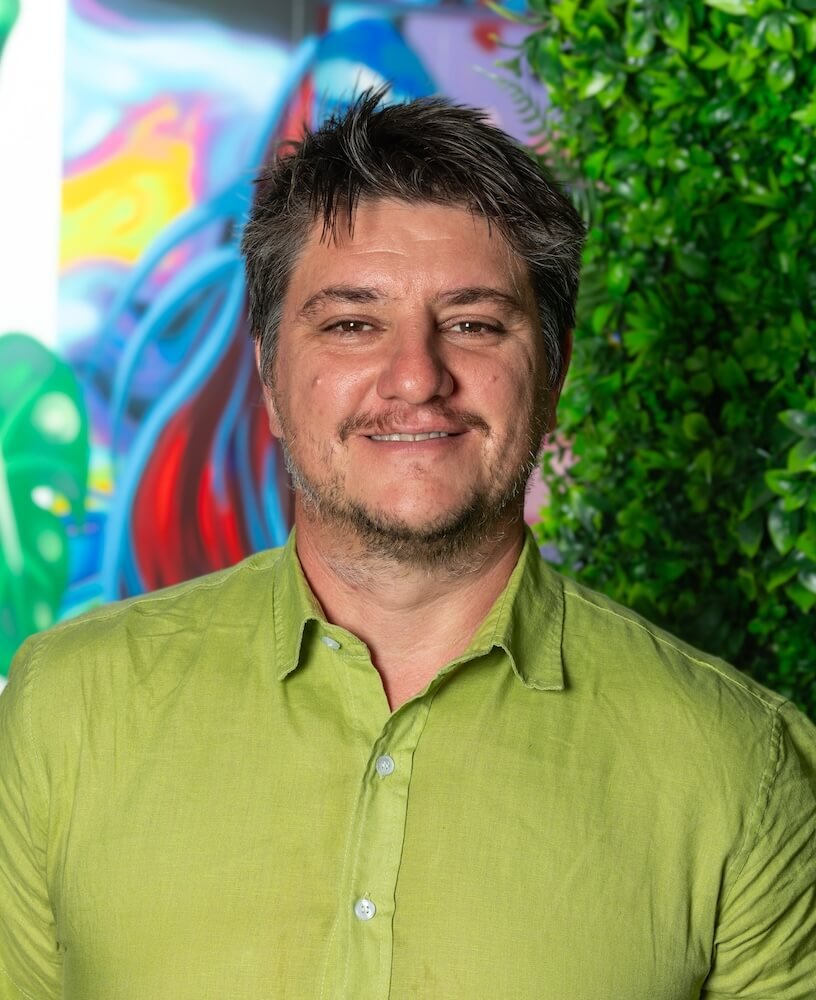 Headshot photo of Ben